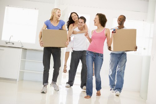 Removal team planning a home move in a Bayswater street