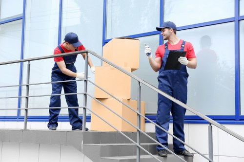 Removal team planning a move on a Bayswater residential street