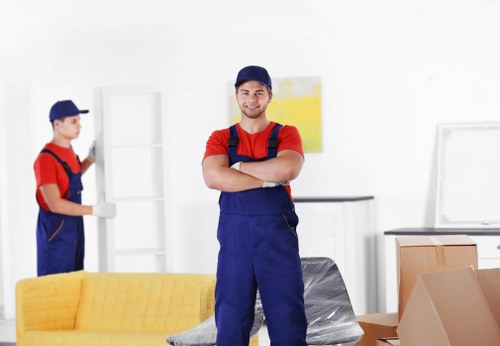 Man and van moving boxes from a Bayswater flat