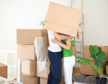 Loading furniture into a van on a Bayswater street